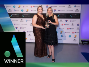Image: Kate Razzivina receiving the Translation Hero Award on behalf of Genics from CSIRO's Tennille Eyre at the InnovationAus 2023 Awards for Excellence. Photo credit: InnovationAus.
